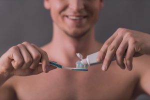 man cleaning teeth BPSFBBH