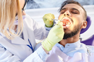 female dentist examining patient 2021 09 24 03 56 57 utc 1